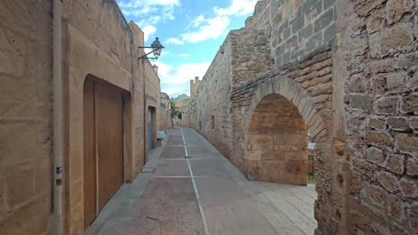 alcudia street next to its wall