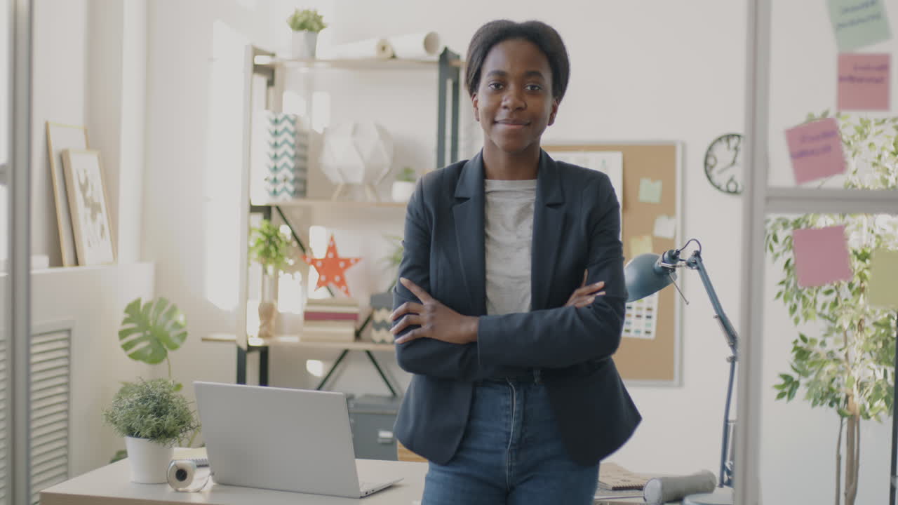 Confident young woman in a modern office