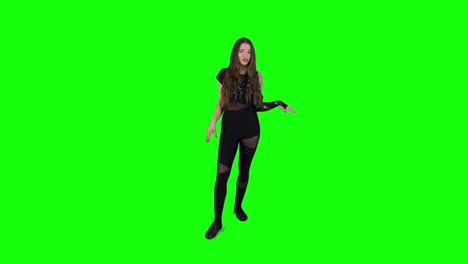 young female actor expressing herself in front of a green screen in slow motion