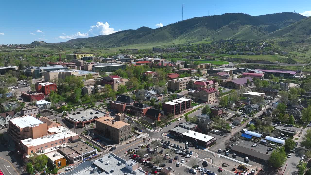 Aerial Drone Flyover of the town of Golden, Colorado on a summer day with Colorado School of Mines in the Background