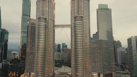 petronas twin towers in kuala lumpur at dusk