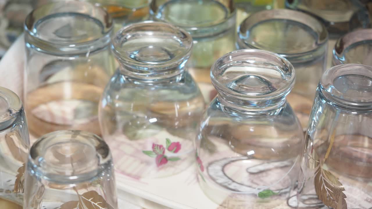 Stacked Empty Drinking Glasses on a Decorative Tray