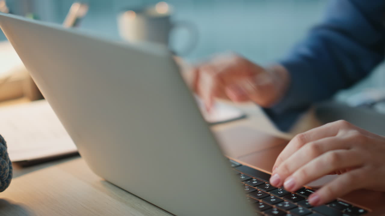 Freelancer hands closing computer closeup. Manager accomplishing task in evening