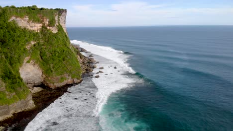 Aerial-wide-shot-over-the-coast-of-Bali,-Indonesia