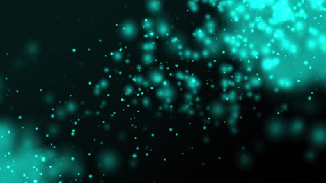partículas azules brillantes flotando hacia arriba sobre un fondo oscuro
