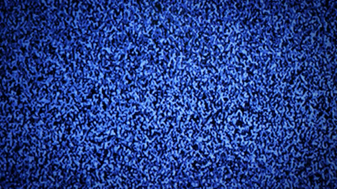 Natural TV noise close-up. Copy space background.