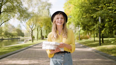 smiling woman walking at park