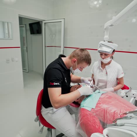 dentist and patient in office