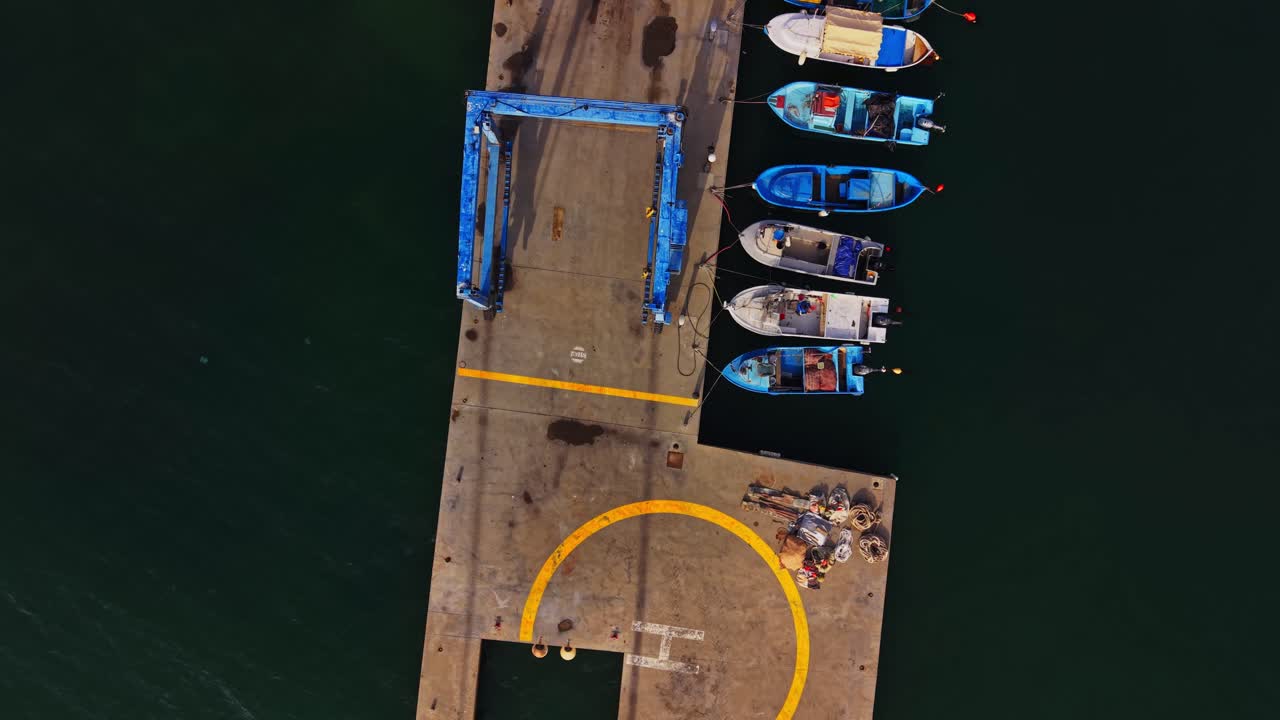 Colorful boats docked at a marina in Bulgaria during a sunny day