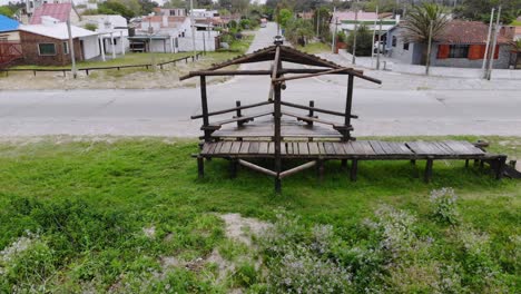 aerial video of a wooden structure on the coast