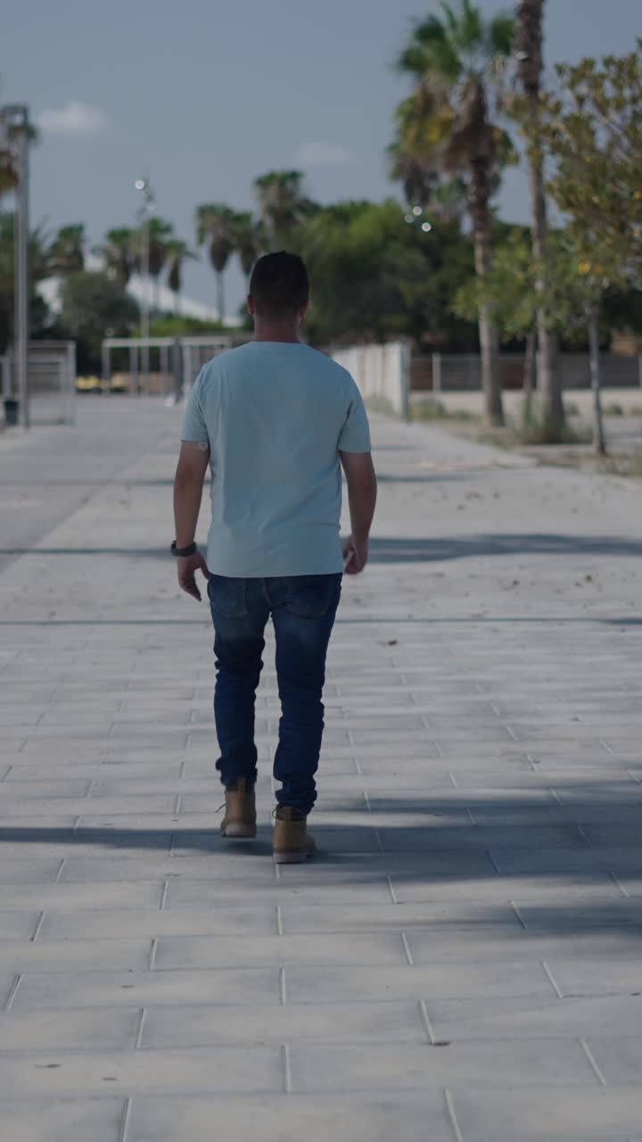 Man walking on a sidewalk