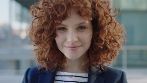 portrait of smiling corporate intern beautiful red head student portrait