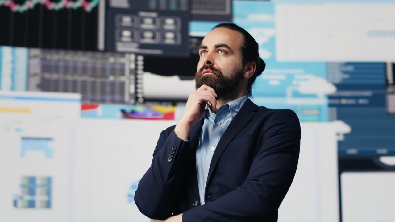 Company CEO reviewing digital graphs and business insight to implement strategy