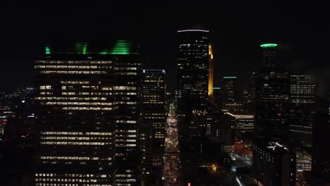 drone sideways dolly through downtown minneapolis on a foggy night 4k