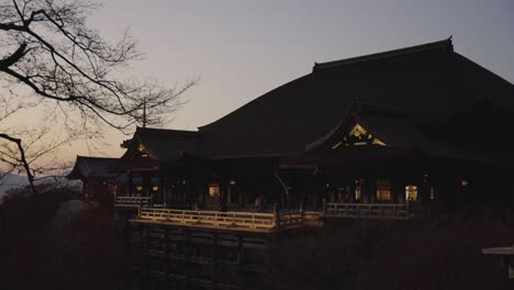 dusk over kiyomizu-dera temple in kyoto japan, slow pan shot