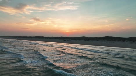 Sunset-Sky-Over-Padre-Island-With-Isolated-Rv-Motorhome-On-Shore-In-Texas,-USA