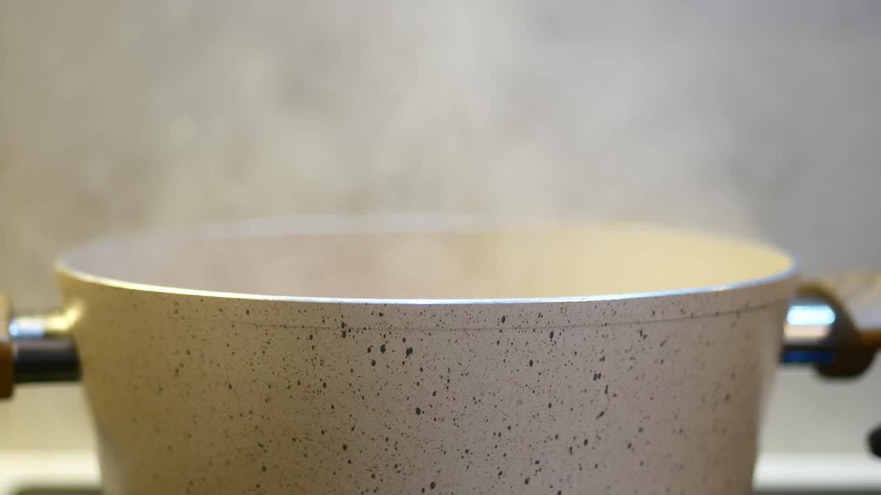 Close-up of a pot of boiling water on a stovetop