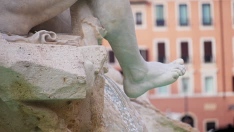 statue detail of the fountain in piazza navona, rome, italy