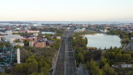 aerial view of the main railway, the railway station, toololahti and the downtown helsinki cityscape, sunny day, in helsinki, finland