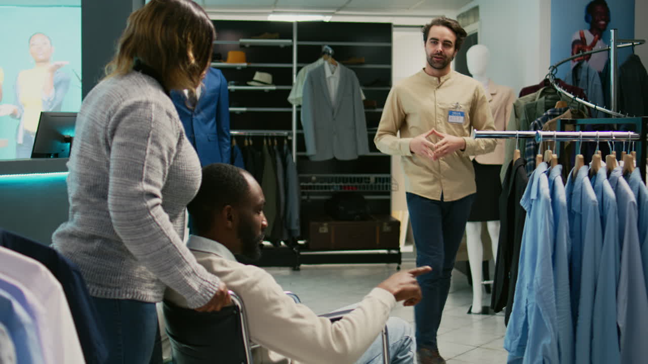 People Shopping for Clothes at a Clothing Store