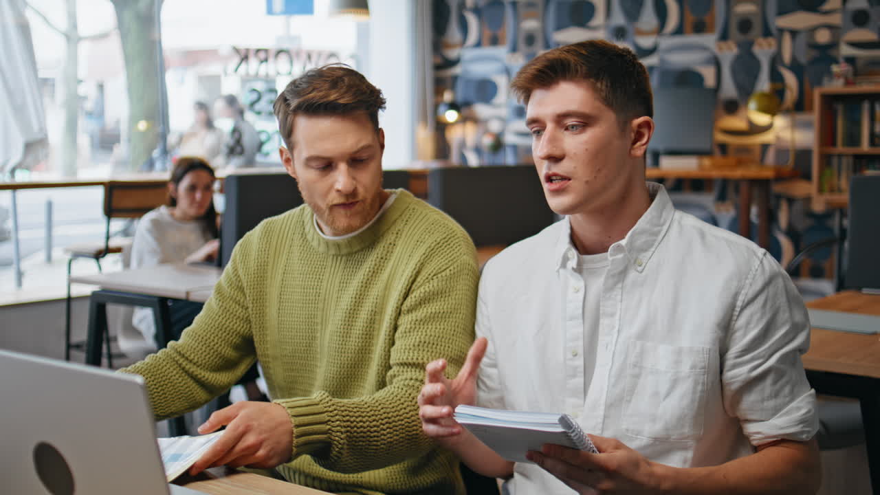 Happy workers talking virtual meeting in office closeup. Businessmen speaking