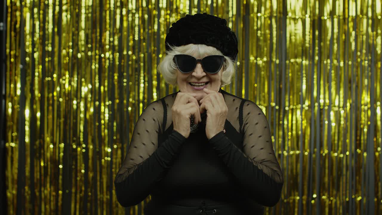 Senior old woman with happy meditative expression, fantasizing, thinking, making positive idea