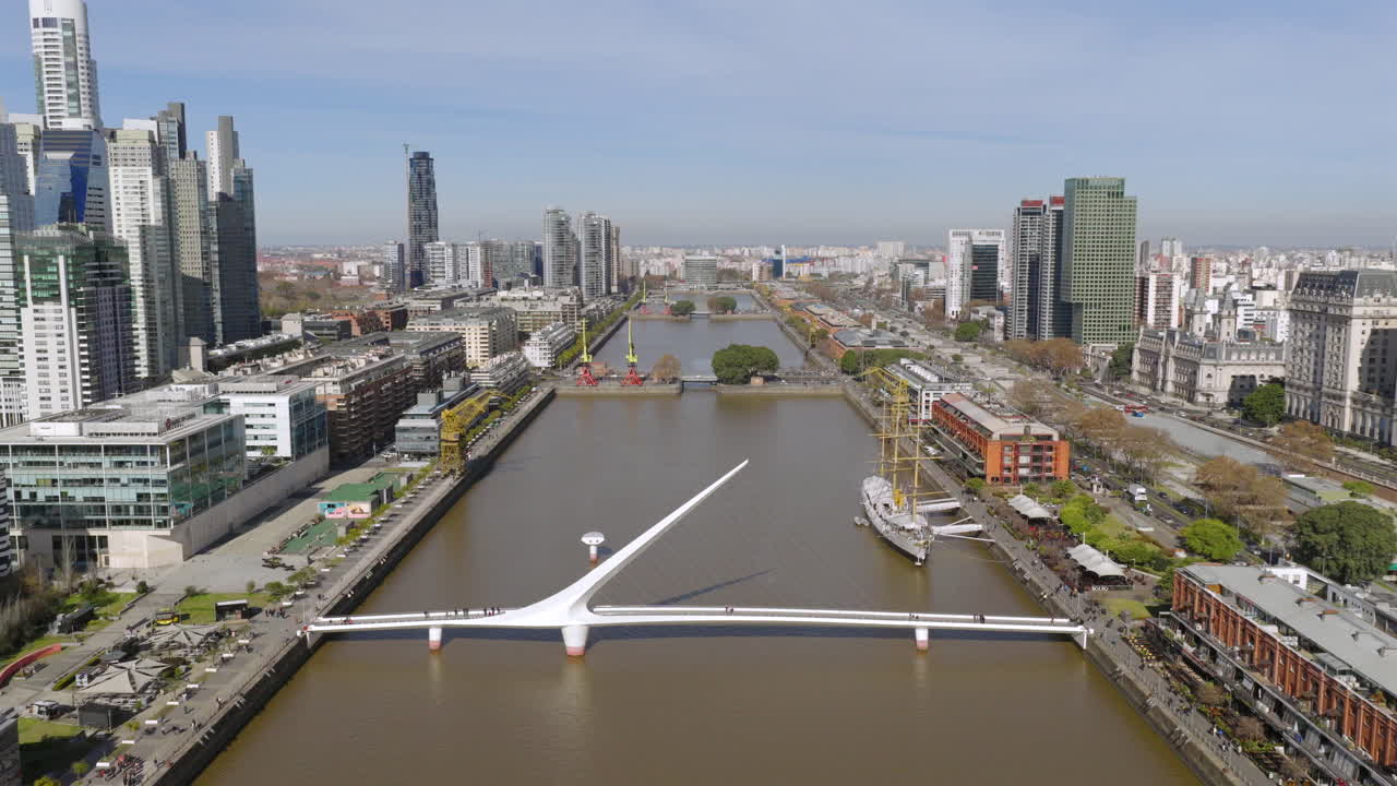 Aerial view of Puente de la Mujer and Puerto Madero waterfront in Buenos Aires, Argentina, on a clear day