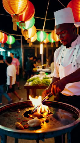street food chef cooking at night market