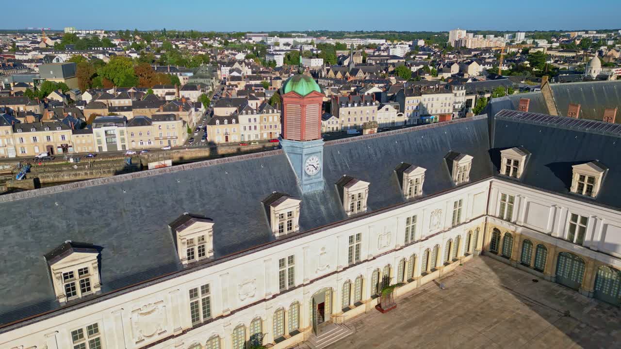 Aerial drone forward close-up of clock tower on Château-Neuf castle, Mayenne in France