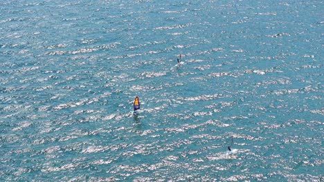 Kitesurfing-hobbyists-at-Riva-Del-Garda-Italy-turquoise-waters