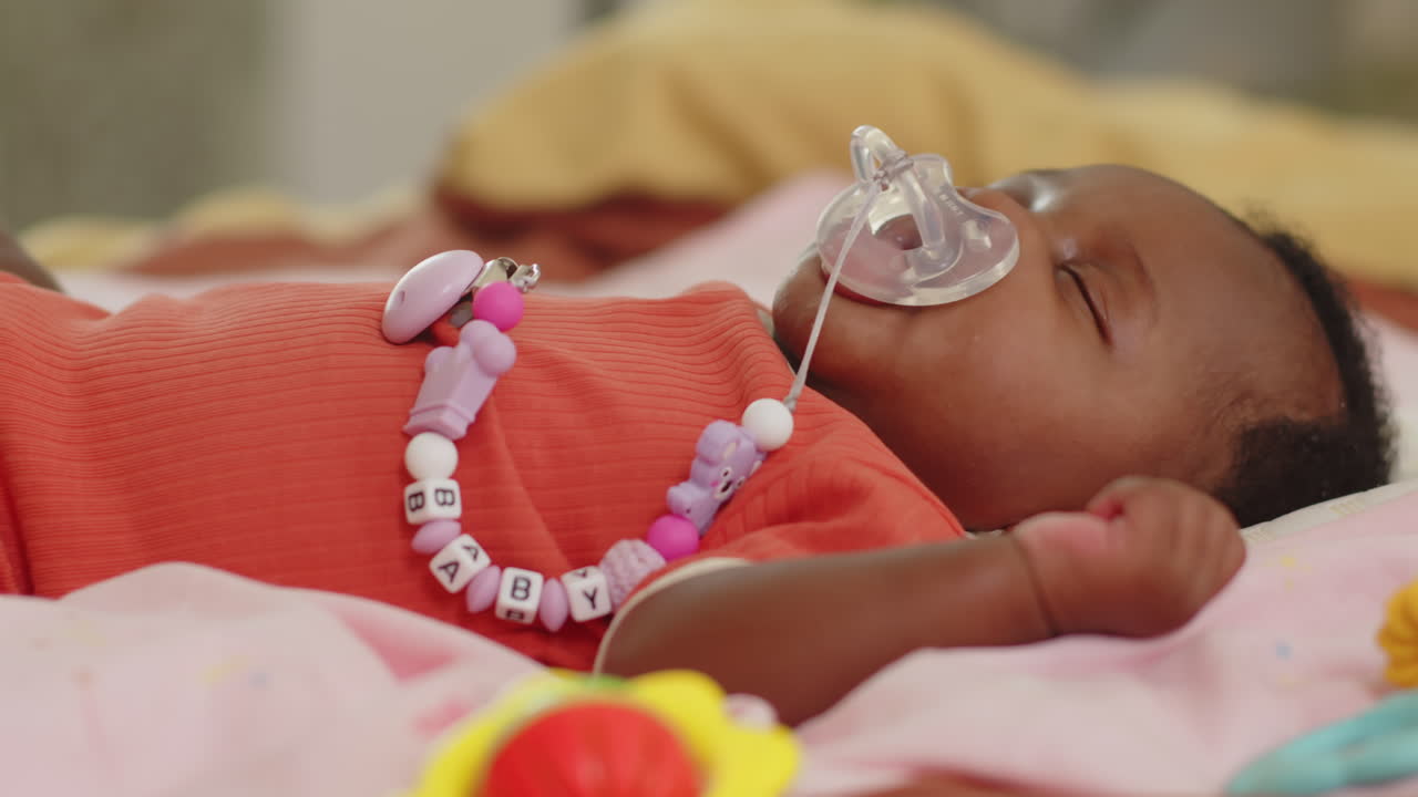 African American Infant Taking Nap at Daytime