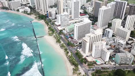 Hawaii-Aerial-Drone-View-downward-pan-of-Waikiki-Hotels-in-Honolulu