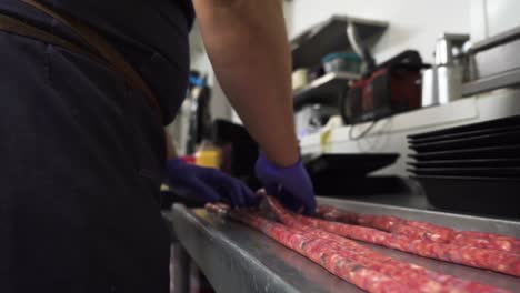 butcher making delicious fresh sausages, close up view