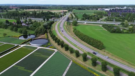 road on sunny day to a bridge at zevenaar, netherlands