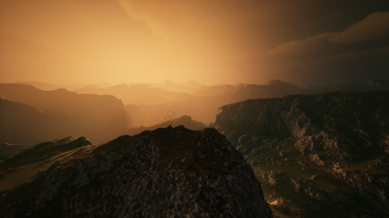 High mountain peaks covered with dramatic heavy fog