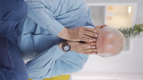 vertical video of sad old man is crying.