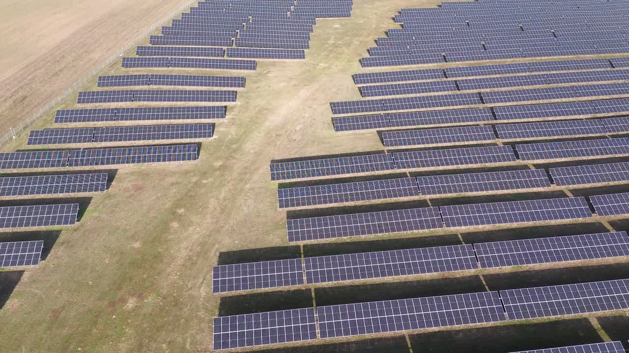 solar farm panel green energy aerial dolly tilt sunny day