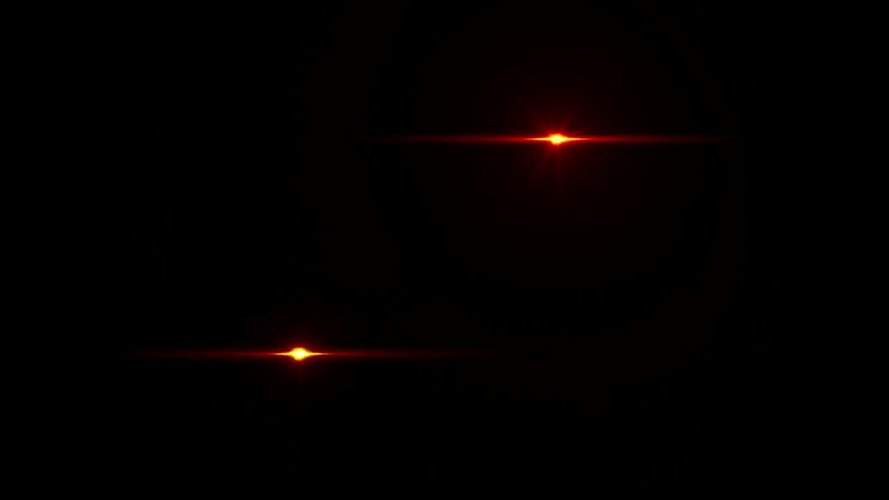 el destello realista de la lente de luz sobre un fondo negro.