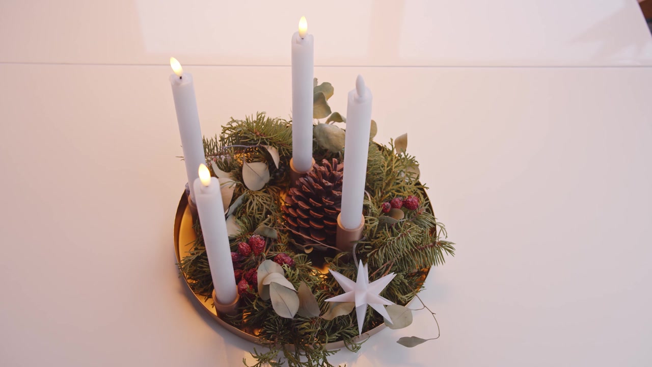 Turning On Electric Candles One by One Christmas Advent Wreath