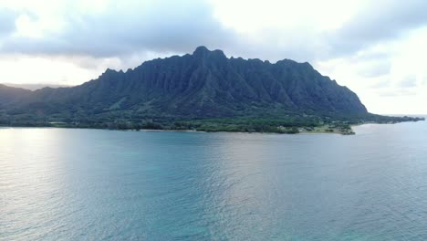 dolly forward with descending aerial shot heading towards koolau mountain