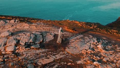 aerial view around the monument to king arthur in britain monument close up on sea background