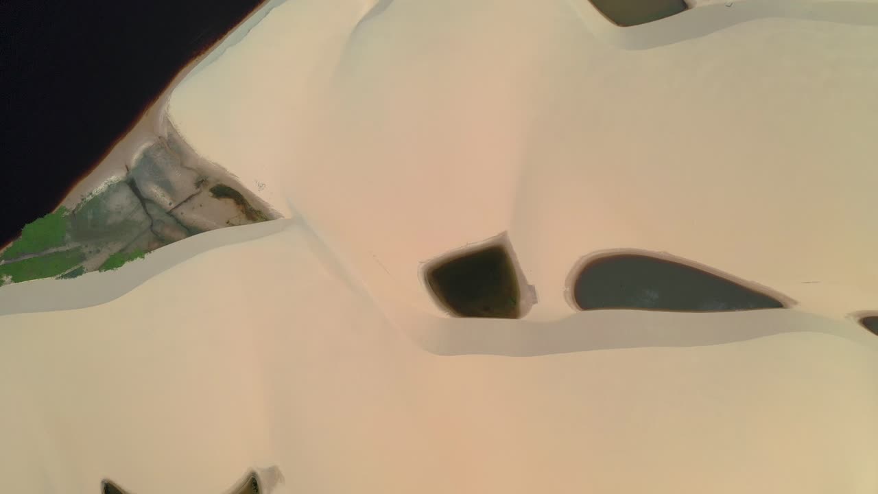 Drone view of dunes and lagoons in Lençóis Maranhenses National Park - Rota Lagoa Azul, Maranhão, Brazil