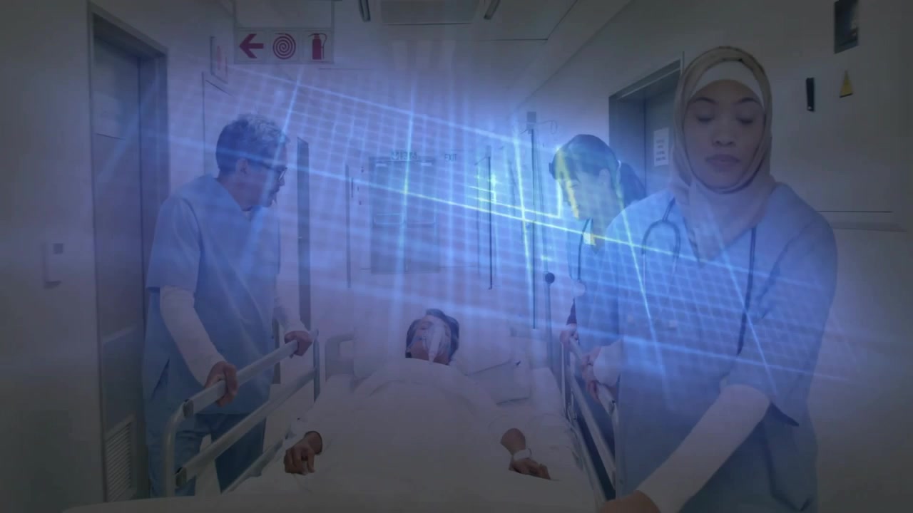 병원 복도에서 간호사가 침대를 밀고, 파란색 격자 오버레이가 나타나는 동안 의사가 IV 라인을 모니터링함