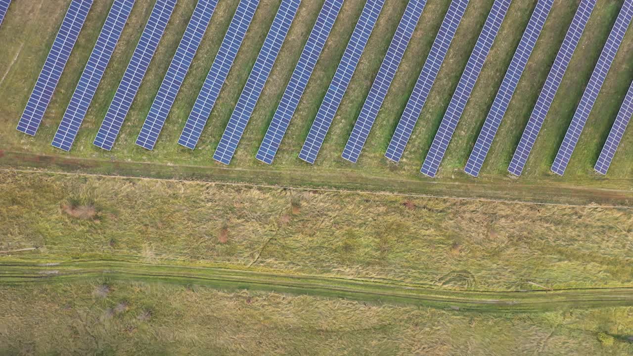 Aerial view of photovoltaic solar panels. Concept of clean energy, green energy, renewable energy. Alternative energy concept.