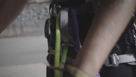 securing rock climbing ropes with carabiner close up