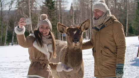 winter selfie with funny deer