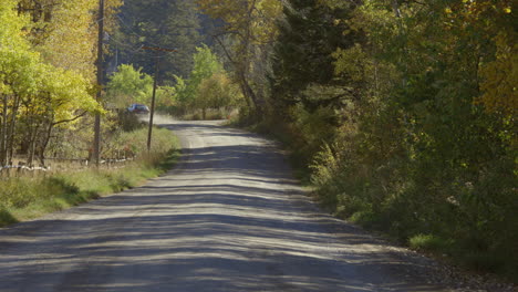 car driving down a country road in montana 4k