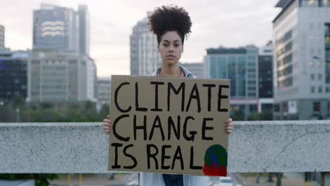 shot of a young woman protesting outside