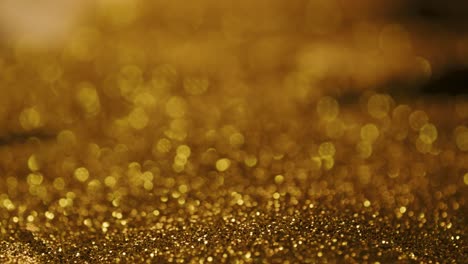 abstract golden glitter, light painting focus pull