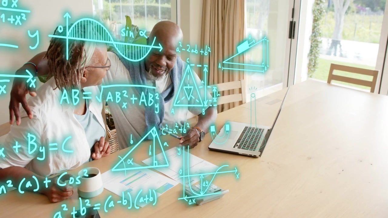 Senior couple sitting at table, man pointing at laptop and activating teal STEM overlay aiding math